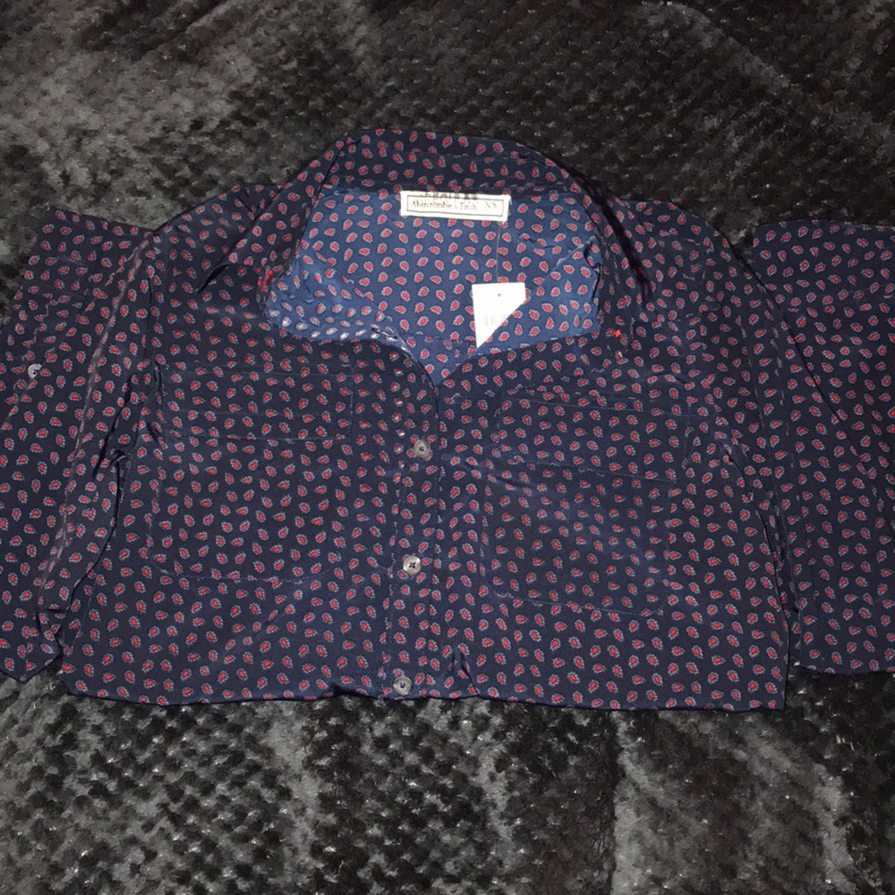 Long sleeve button down shirt.